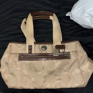Coach Daisy Signature vintage tan/cream with brown trim and silver hardware
